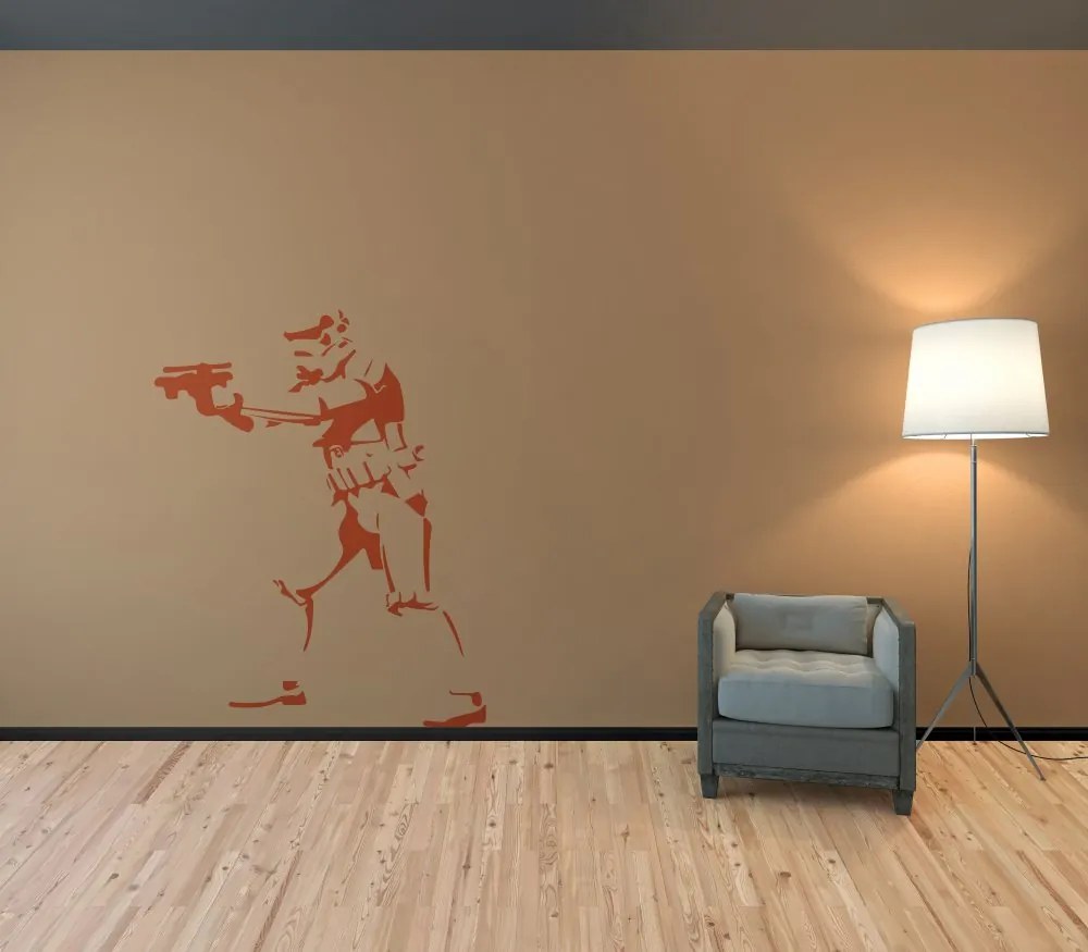 GLIX Banksy "Trooper" - autocolant de perete Portocaliu 50 x 65 cm