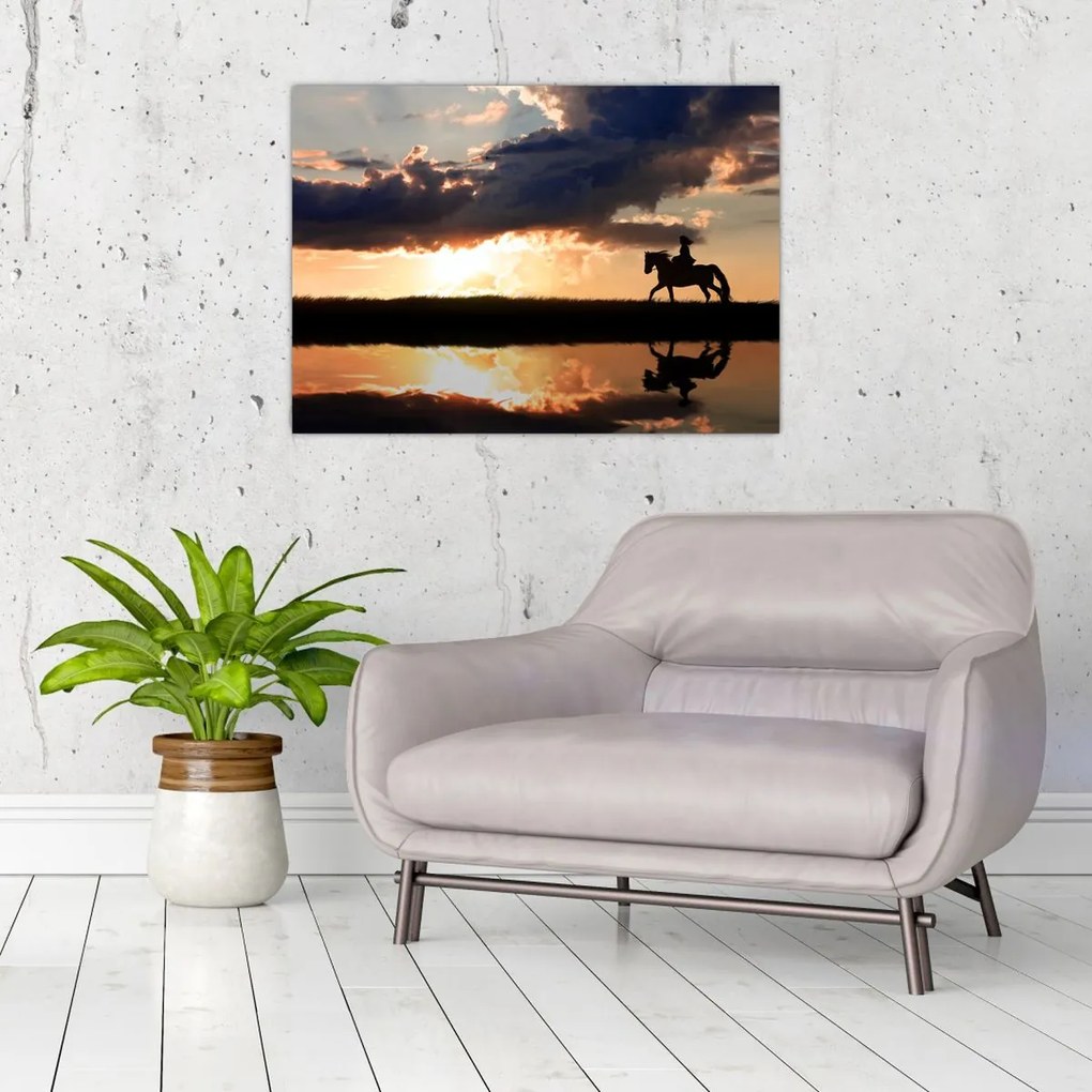 Tablou - Rider pe un cal la apus de soare (70x50 cm)