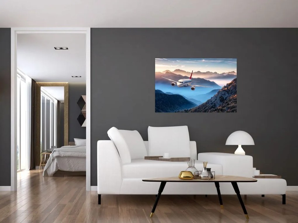 Tablou - Avion peste crestele montane (90x60 cm)