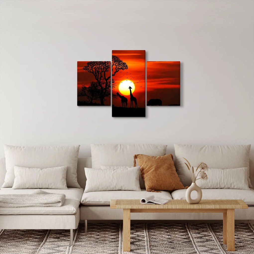 Tablou - Siluete animalelor la apus de soare (90x60 cm)