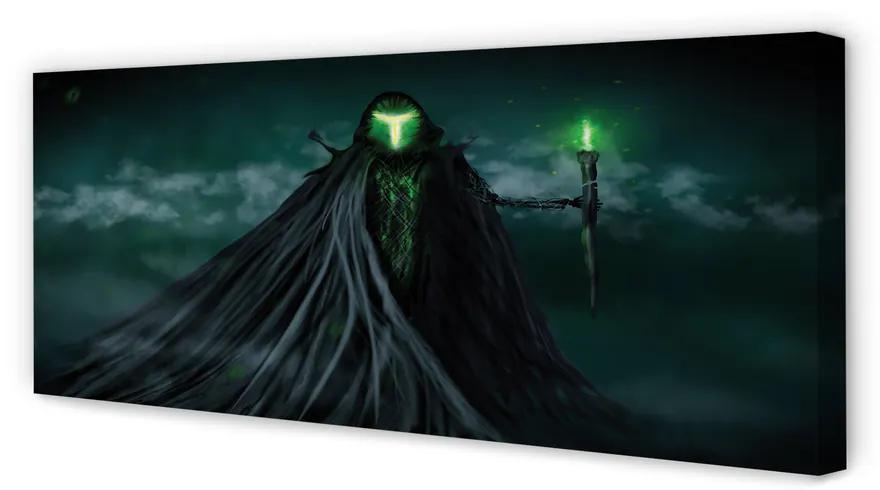 Tablouri canvas Figura întunecată de foc verde