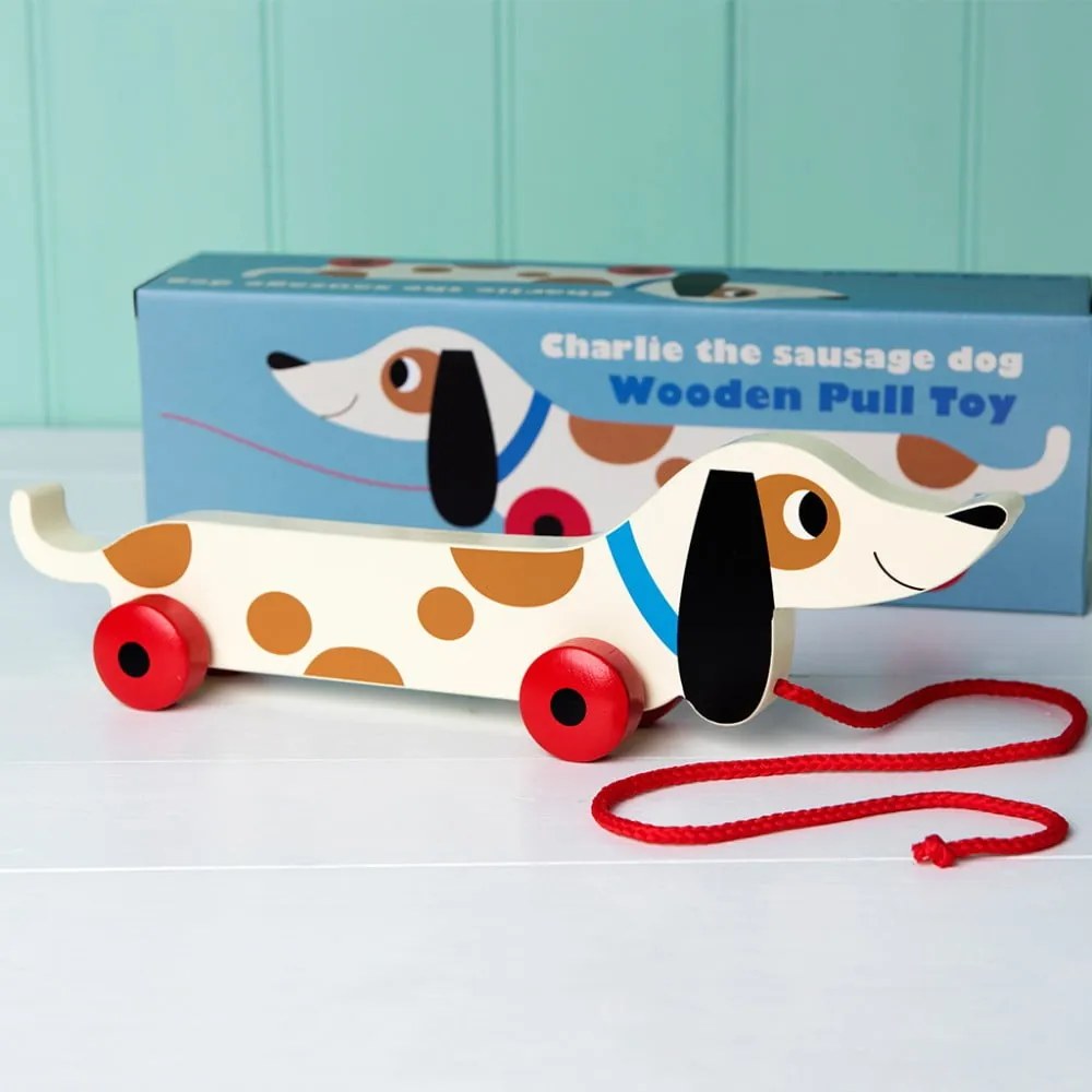 Jucărie - cățel din lemn pe roți Rex London Charlie The Sausage Dog, lungime 31,5 cm