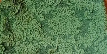 Husa elastica pentru coltar, cu volanas, model Jacquard Verde