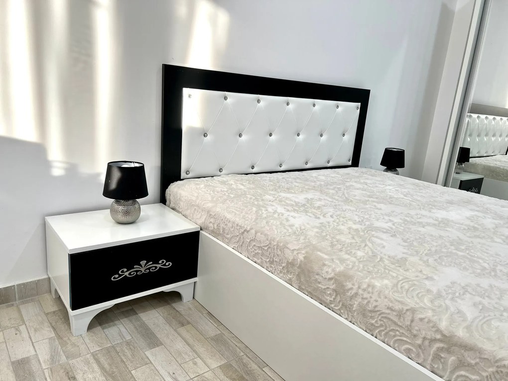 Dormitor Milano, culoare alb / negru, cu pat tapitat 160 x 200 cm, dulap cu 2 usi, comoda cu oglinda, 2 noptiere