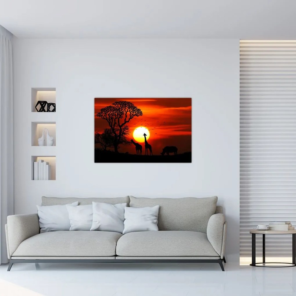Tablou - Siluete animalelor la apus de soare (90x60 cm)