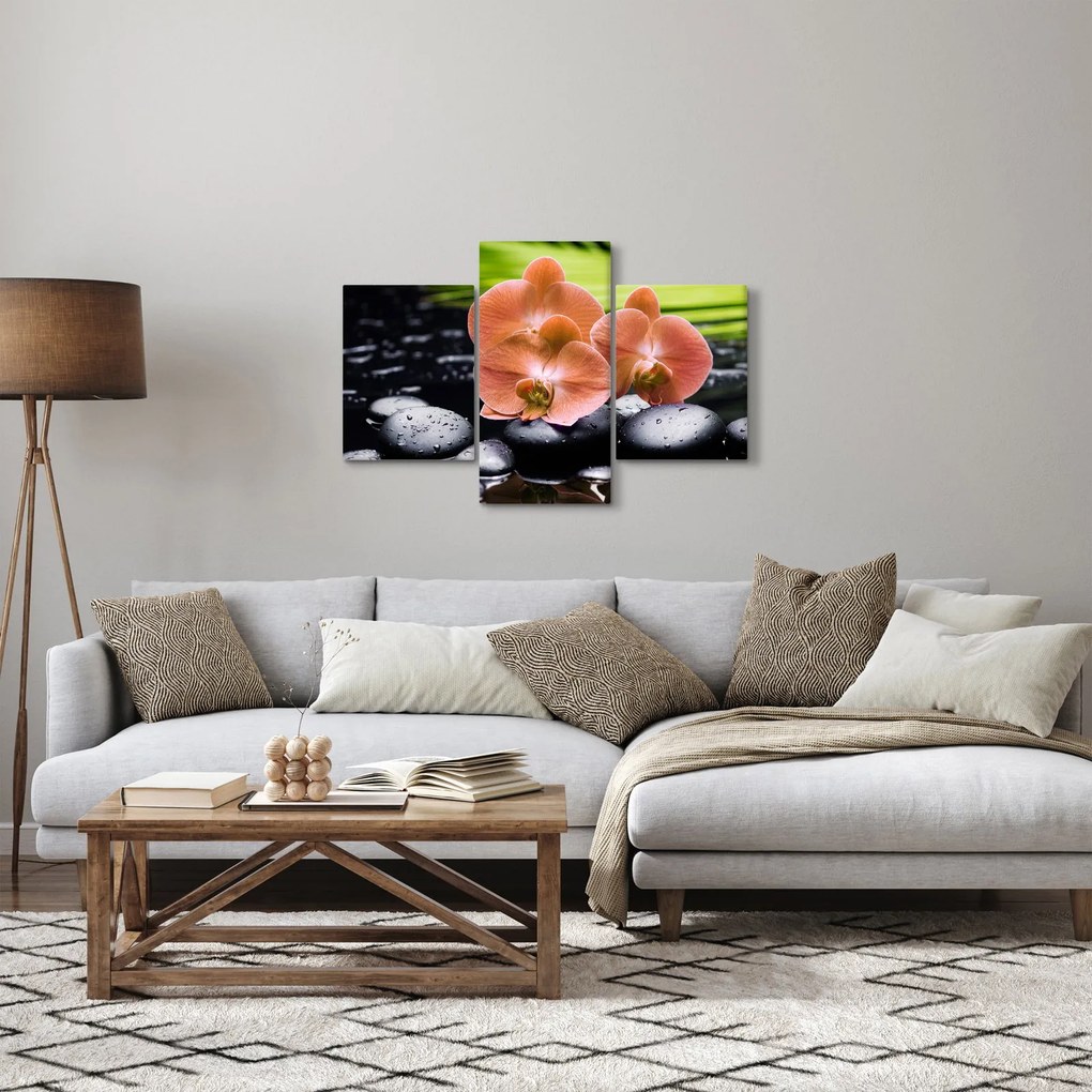 Tablou - Orhidee portocalie cu frunze de palmier (90x60 cm)