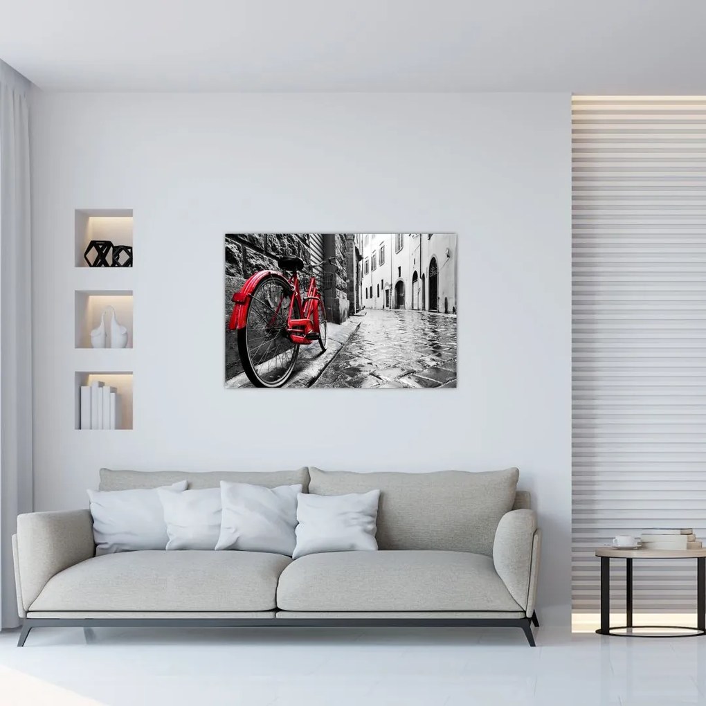 Tablou - Bicicleta roșie pe o stradă pavată (90x60 cm)