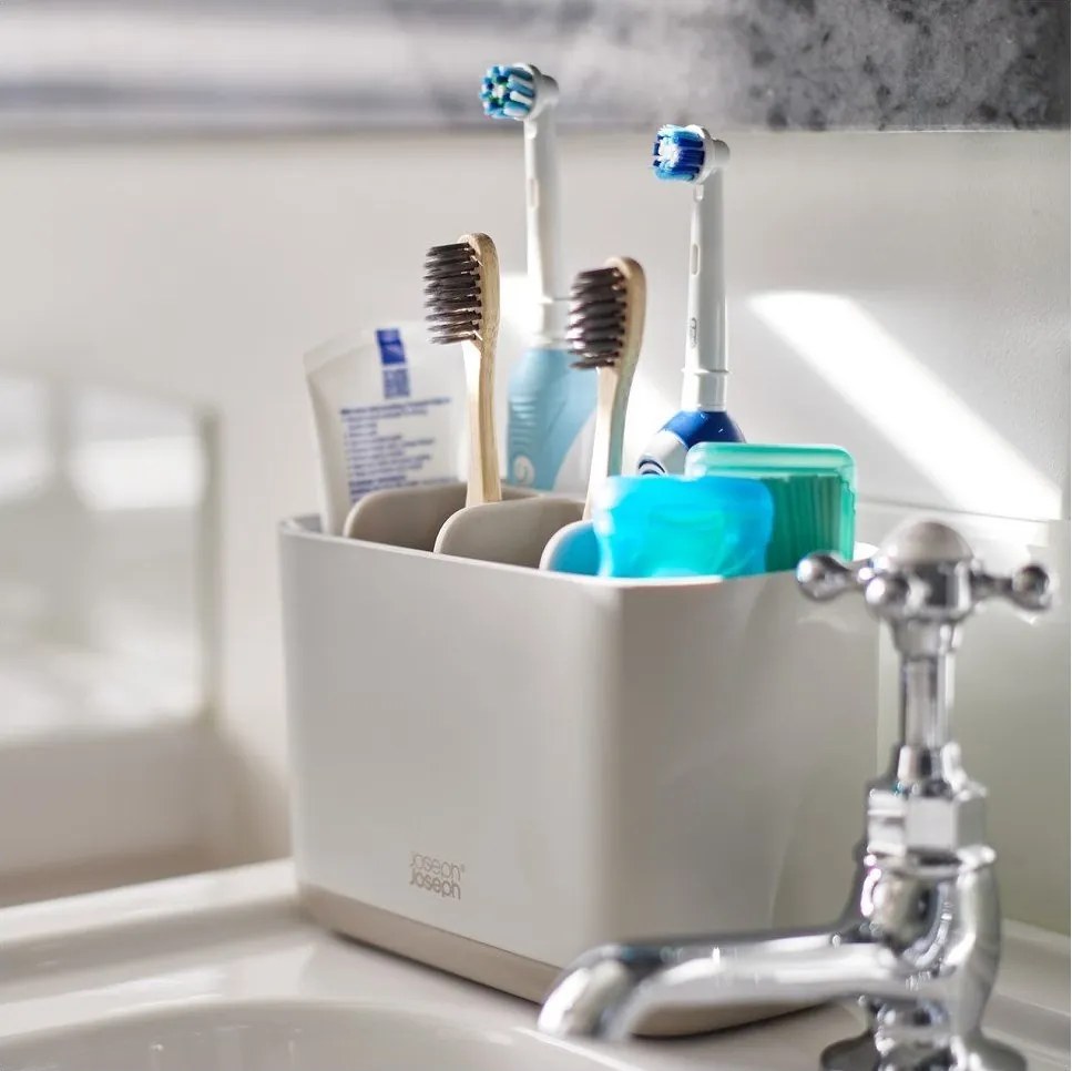 Suport pentru periuța de dinți bej din plastic EasyStore – Joseph Joseph