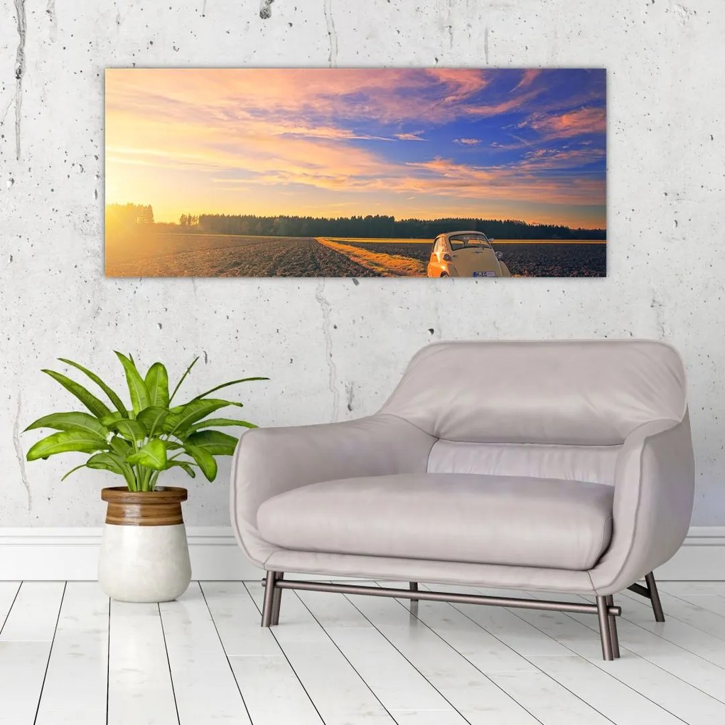 Tablou - Mașină galbenă ăn câmp (120x50 cm)