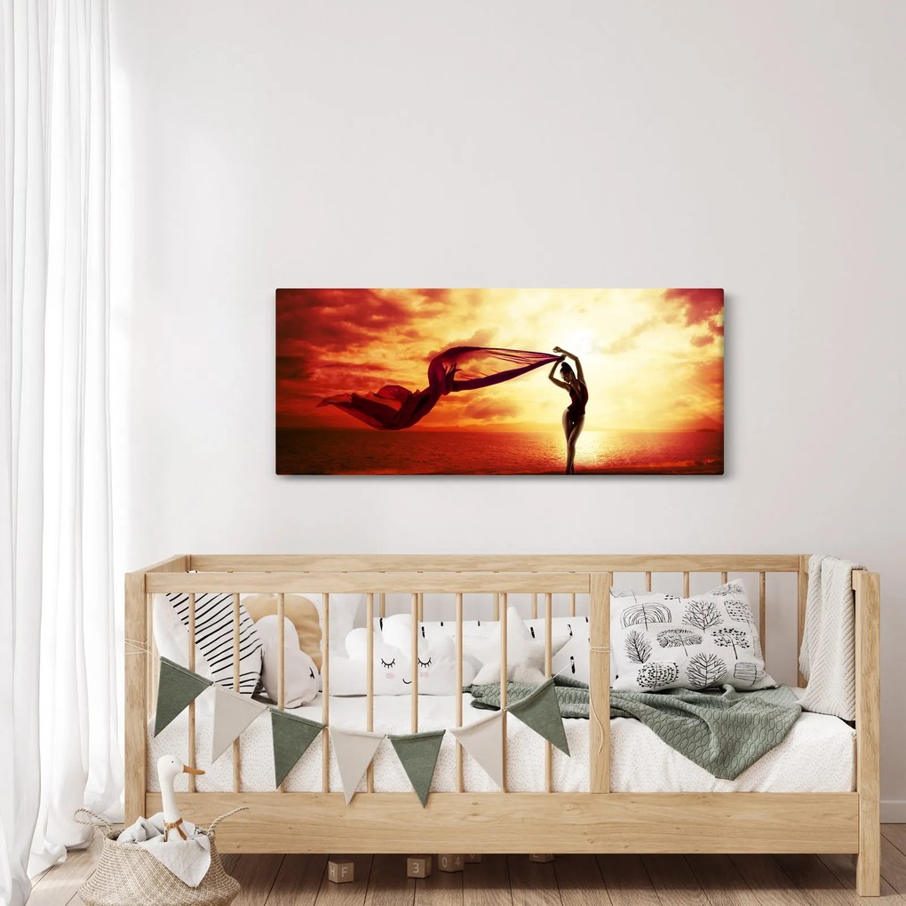 Tablou - Silueta femeii la apus de soare (120x50 cm)