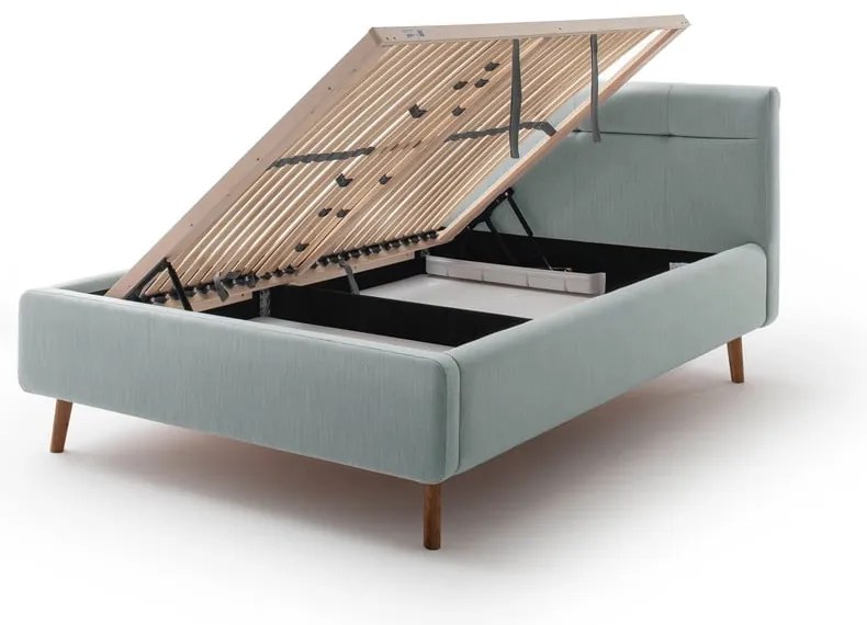 Pat matrimonial albastru deschis tapițat cu spațiu de depozitare cu somieră 140x200 cm Lotte – Meise Möbel
