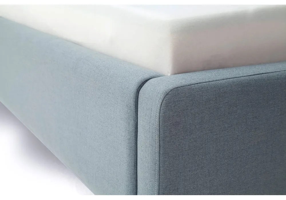 Pat matrimonial albastru prăfuit tapițat cu spațiu de depozitare cu somieră 140x200 cm Mattis – Meise Möbel