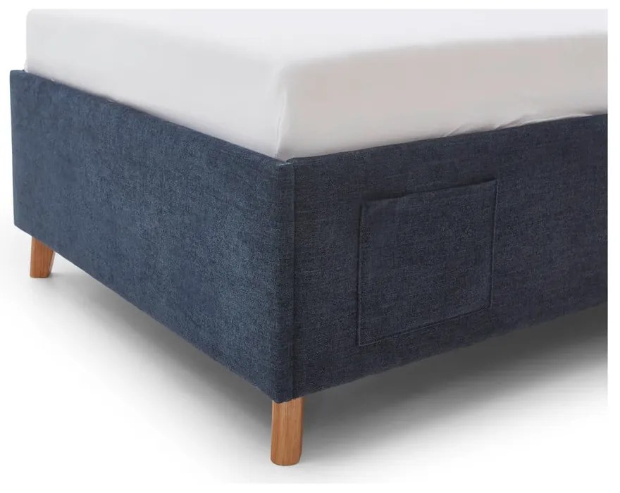 Pat pentru copii albastru închis tapițat cu spațiu de depozitare cu somieră 90x200 cm Fun – Meise Möbel