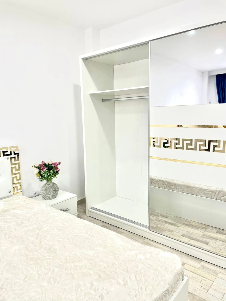 Dormitor Palermo, culoare alb, cu pat tapitat 160 x 200 cm, dulap cu 2 usi, comoda cu oglinda, 2 noptiere