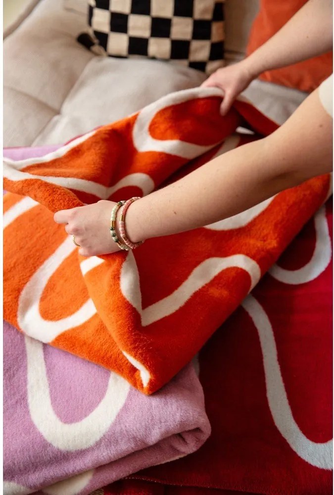 Pătură portocalie 150x200 cm Swirl – noo.ma
