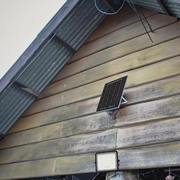 Proiector LED solar de exterior LED/10W/3,2V IP65 4000K negru + telecomandă