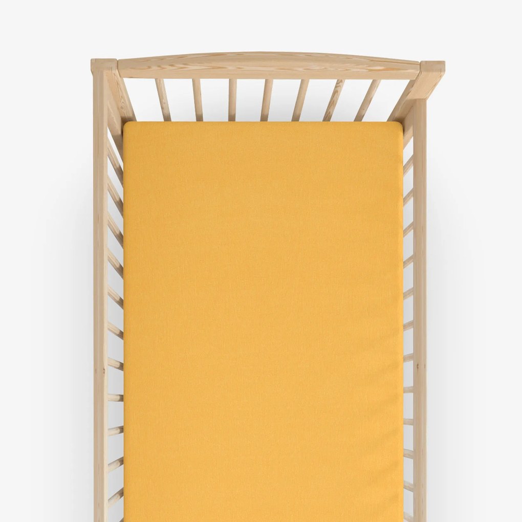 Goldea cearceaf pentru pătuț din jersey cu elastic - mango 70 x 140 cm
