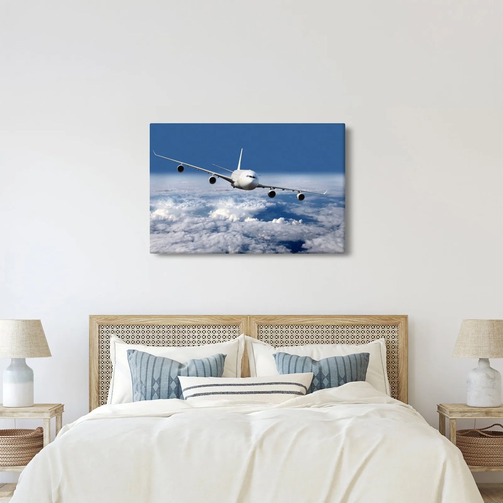 Tablou - Avion în nori (90x60 cm)