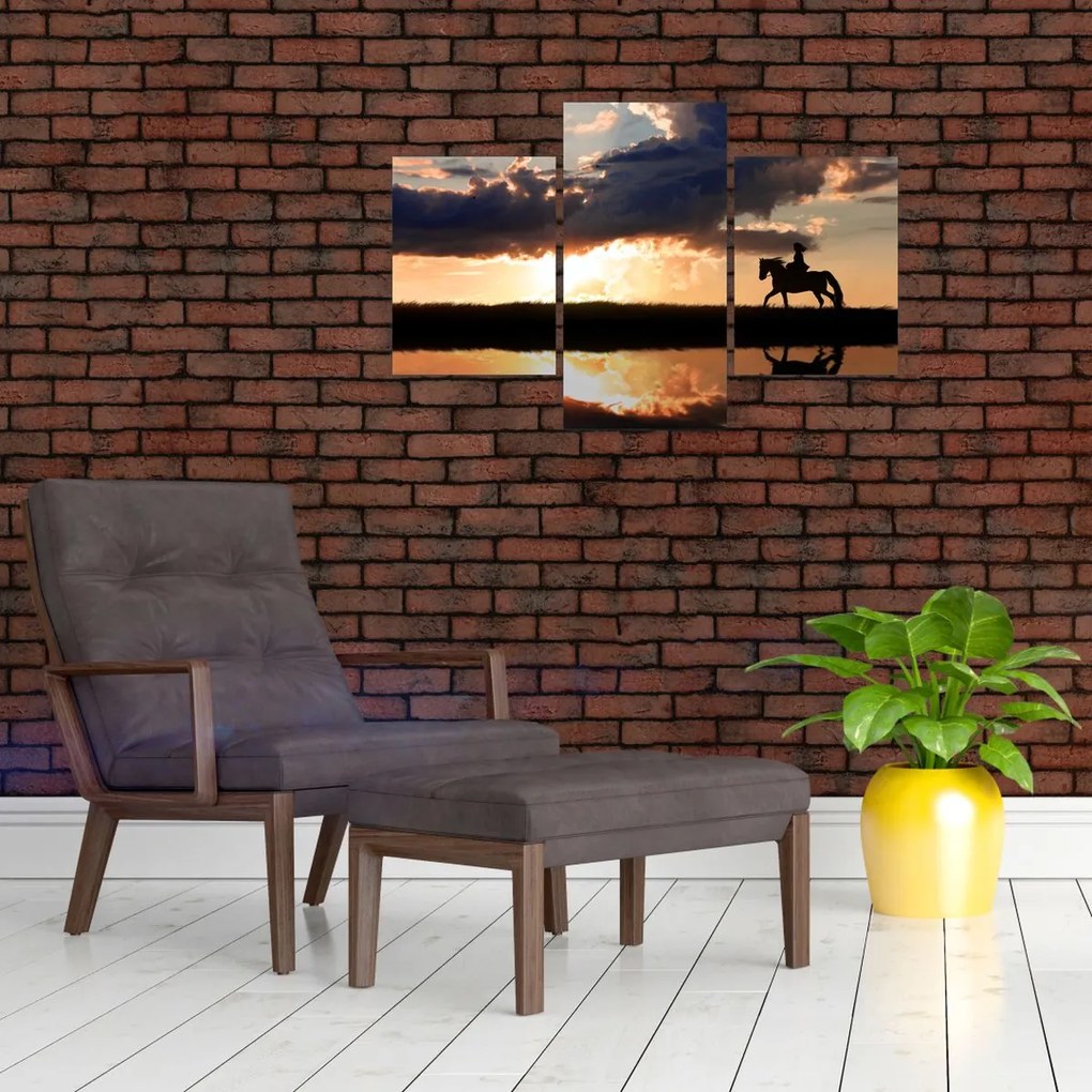 Tablou - Rider pe un cal la apus de soare (90x60 cm)