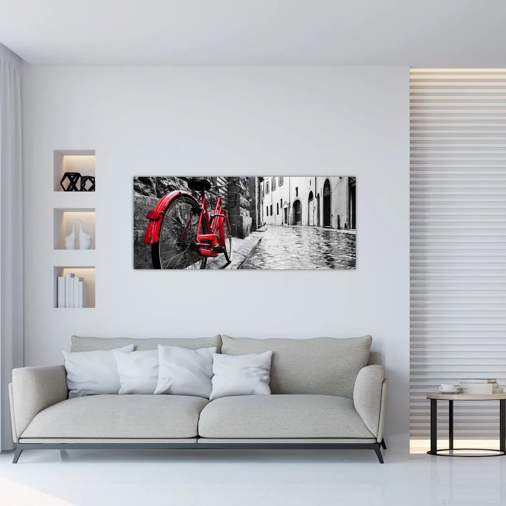 Tablou - Bicicleta roșie pe o stradă pavată (120x50 cm)