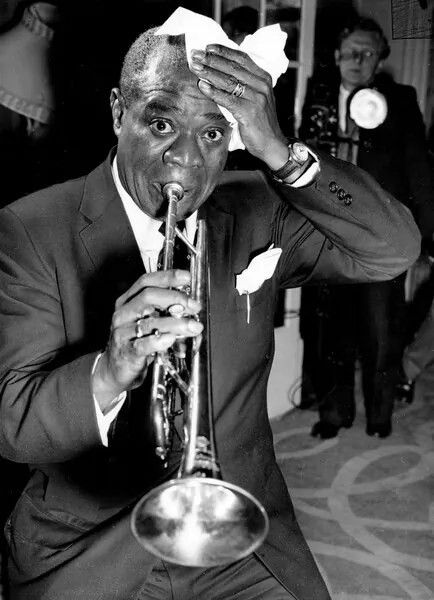 Fotografie Louis Armstrong during a conference at the Savoy Hotel, 1956