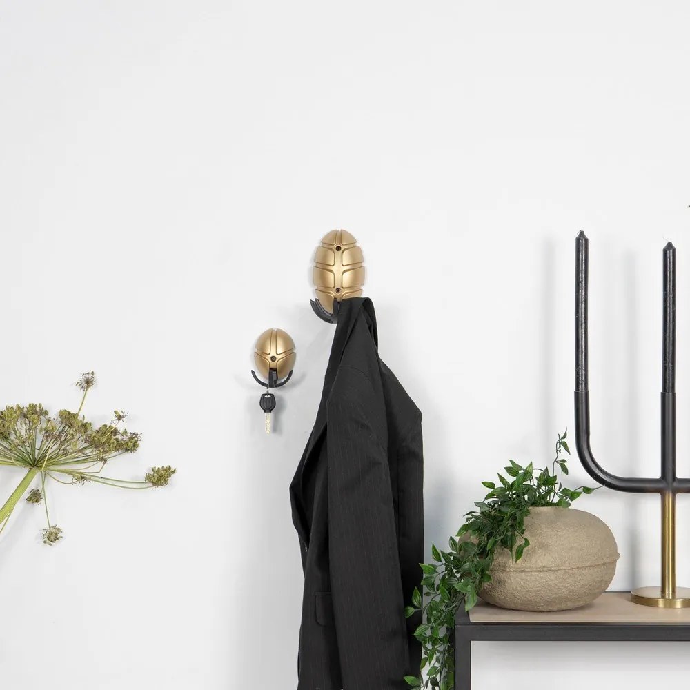 Cârlig negru/auriu de montat pe perete din plastic Tick – Spinder Design