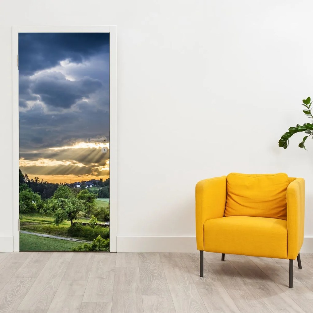 Fototapet pentru ușă - Peisaj cu razele solare (95x205cm)