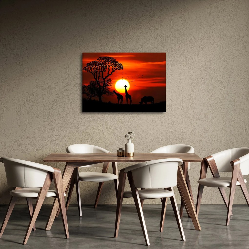 Tablou - Siluete animalelor la apus de soare (70x50 cm)