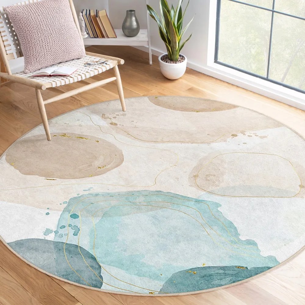 Covor albastru/bej lavabil rotund ø 100 cm Puddle – Mila Home