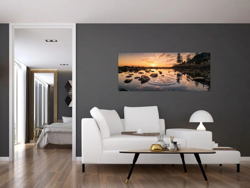 Tablou - Suprafața apei la apus de soare (120x50 cm)