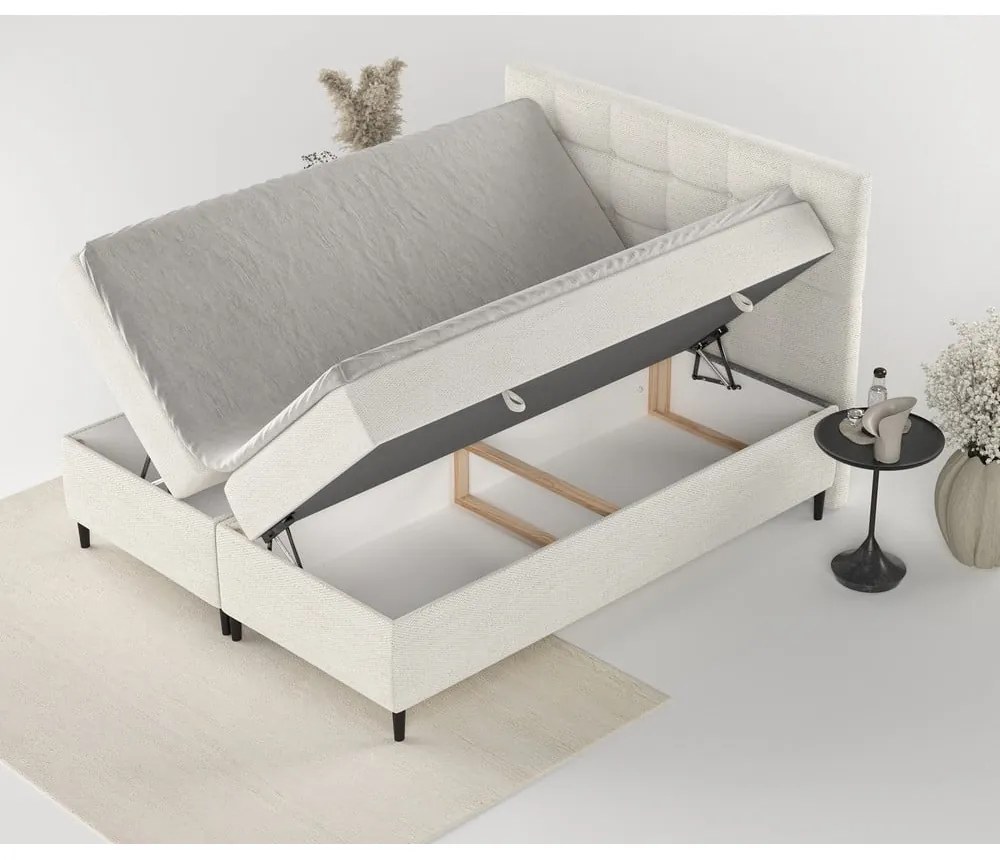 Pat boxspring crem cu spațiu de depozitare 180x200 cm Urbaneo – Maison de Rêve