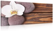 Tablou pietre wellness și orhidee pe fundalul din lemn
