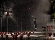 Fotografie Man shooting basketball at night in, Adam Weiss