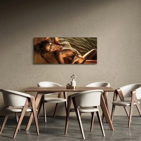 Tablou cu femeia întinsă pe plajă (120x50 cm)