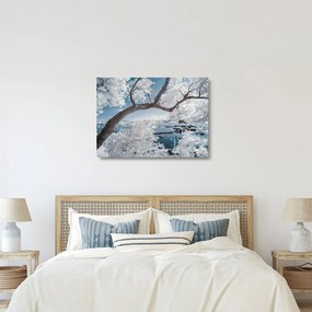 Tablou pe sticlă cu copac înzăpezit lângă apă (70x50 cm)