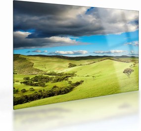 Tablou pe sticlă - Peisaj verde cu dealuri (70x50 cm)