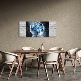 Tablou cu flutere albastru pe perete (120x50 cm)
