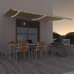 vidaXL Copertină retractabilă manual cu LED, galben și alb, 600x350 cm