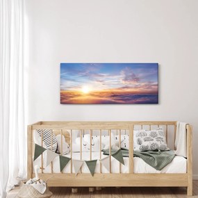 Tablou - Apus de soare deasupra norilor (120x50 cm)