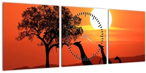 Tablou cu girafe în apus de soare (cu ceas) (90x30 cm)