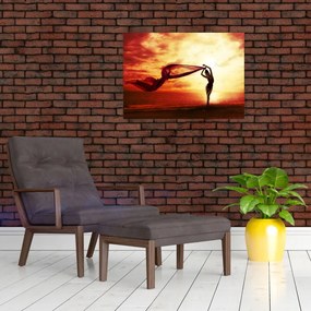 Tablou pe sticlă - Silueta femeii la apus de soare (70x50 cm)