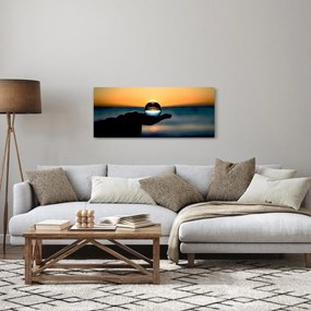 Tabloul cu bilă din sticlă în palmă (120x50 cm)
