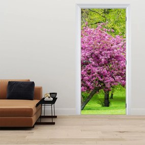 Fototapet pentru ușă - Copac înflorit în pajiște (95x205cm)