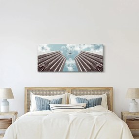 Tablou cuavion între clădiri (120x50 cm)