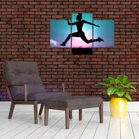 Tablou cu silueta feminină sărind (90x60 cm)