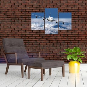 Tablou - Avion în nori (90x60 cm)