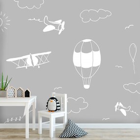 Fototapet - Zbor în cer - avioane desenate pe fundal gri cu nori