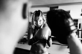 Fotografie Woman boxer workout with coach, massimo colombo