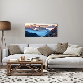 Tablou - Avion peste crestele montane (120x50 cm)