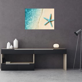 Tablou pe sticlă - Stea de mare pe plajă (70x50 cm)